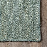 Tapis en jute vert tissé à la main Rigo 