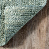 Tapis en jute vert tissé à la main Rigo 