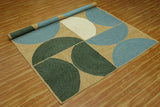 Tapis en jute tressé géométrique vert et bleu, idéal pour les zones à fort trafic dans la chambre 